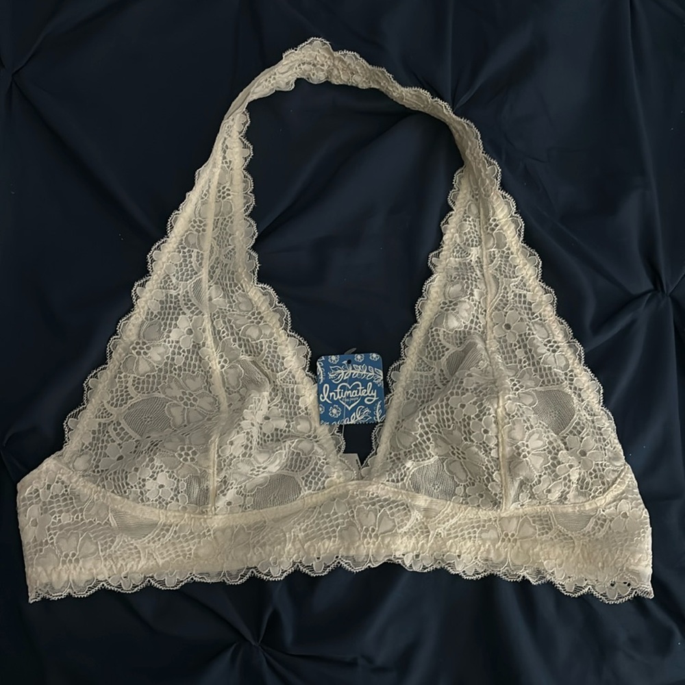 This is a cream colored bralette from free people